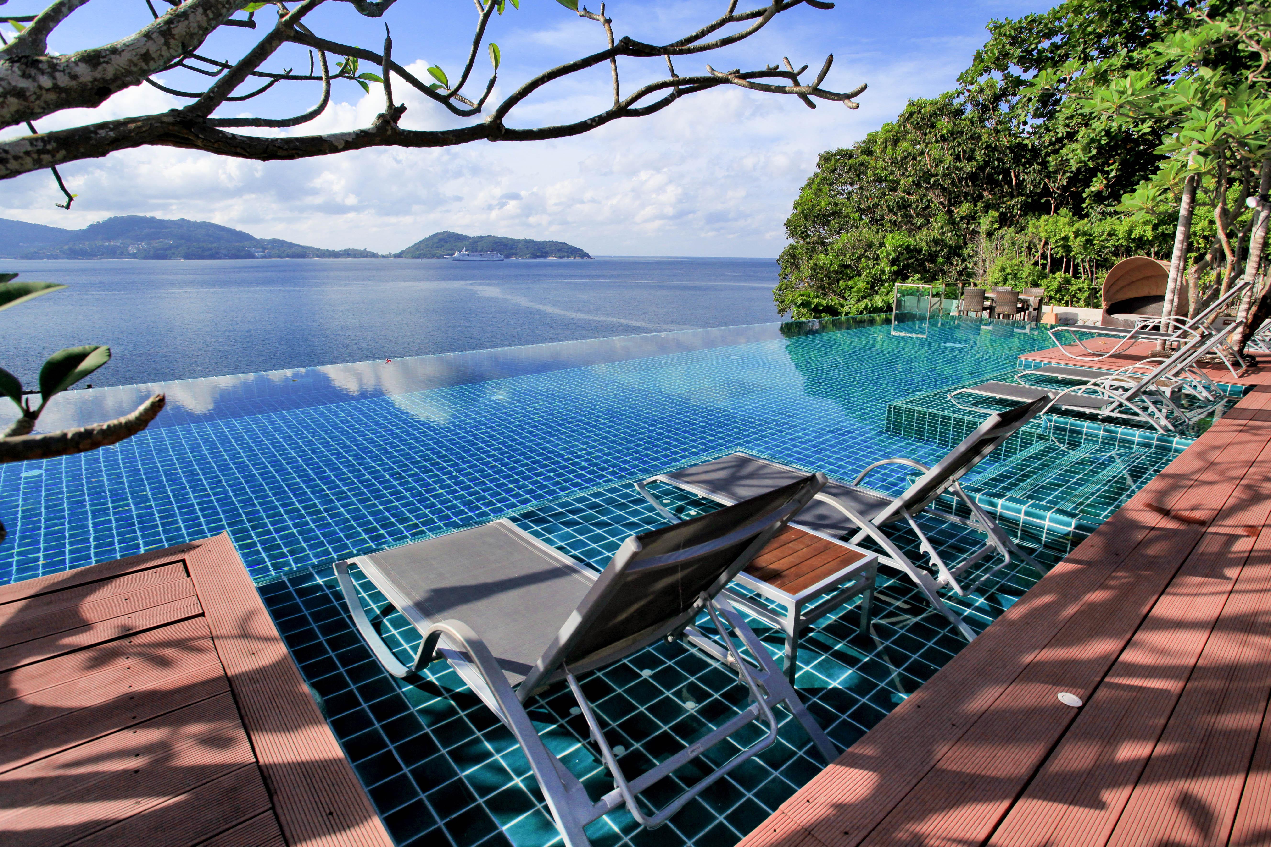 Zenmaya Oceanfront Phuket, Trademark Collection By Wyndham Patong Bagian luar foto Infinity pool at a resort in Phuket, Thailand